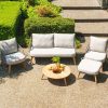 4 Seasons Outdoor Ancora Loungeset teak met voetenbank en loungetafel sfeer